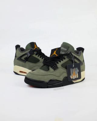 Undefeated Air Jordan 4 replica sneakers featuring a unique colorway and premium detailing, perfect for sneaker enthusiasts and collectors.