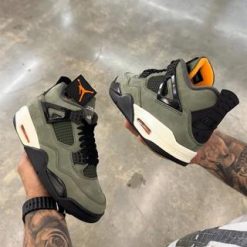 Undefeated Air Jordan 4 replica sneakers featuring a distinctive colorway and premium materials, perfect for sneaker enthusiasts and collectors.
