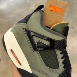 Undefeated Air Jordan 4 replica sneakers featuring a premium design with iconic colorways, perfect for sneaker enthusiasts and collectors.