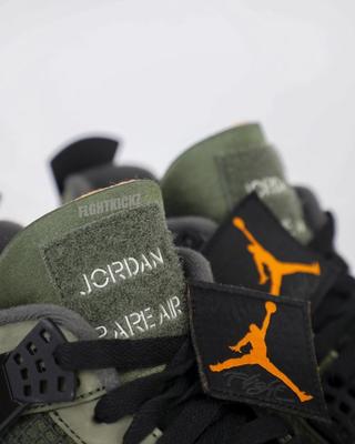 Undefeated Air Jordan 4 2025 replica sneakers showcasing a stylish design with premium materials and attention to detail, perfect for sneaker enthusiasts seeking high-quality alternatives.