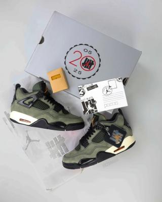 Undefeated Air Jordan 4 replica sneakers displayed with a stylish design, featuring a unique colorway and premium materials, perfect for sneaker enthusiasts and collectors.