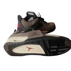 Travis Scott x Air Jordan AJ4 brown replica sneakers showcasing a stylish design with premium materials, perfect for sneaker enthusiasts seeking high-quality replicas.
