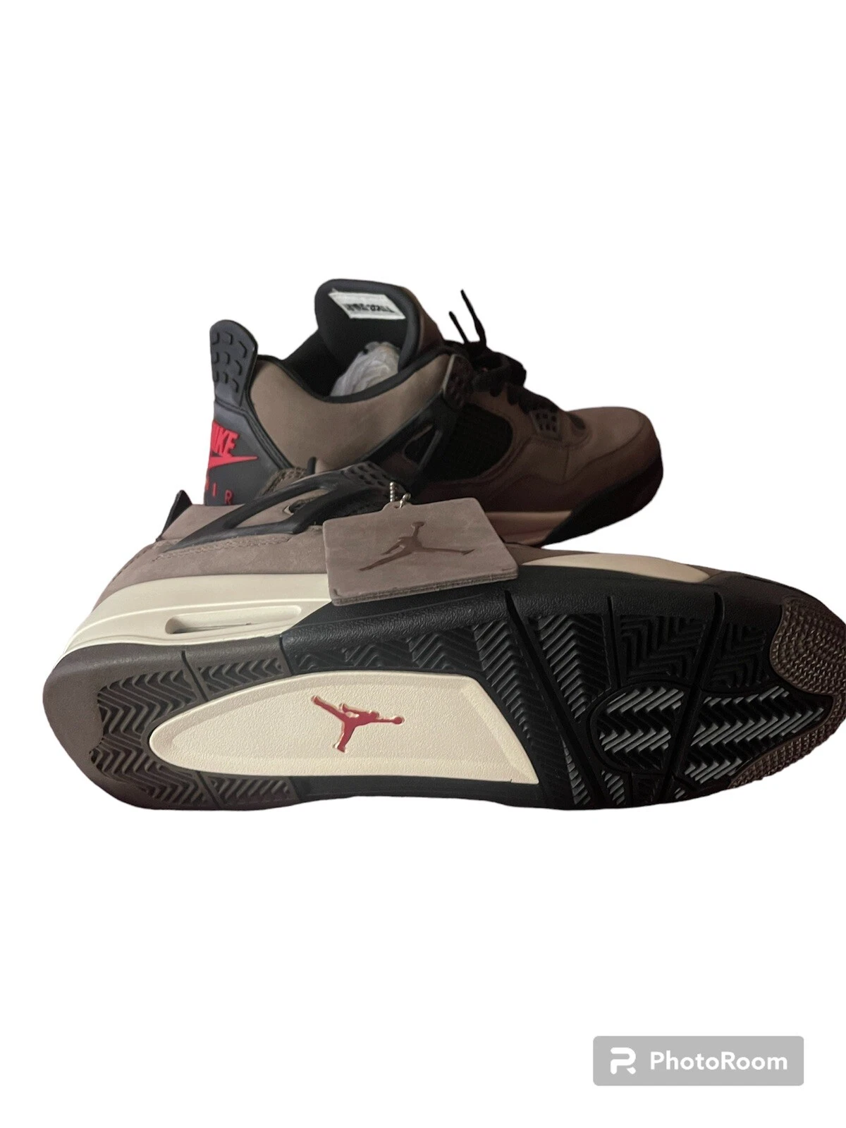 Travis Scott x Air Jordan AJ4 brown replica sneakers showcasing a stylish design with premium materials, perfect for sneaker enthusiasts seeking high-quality replicas.