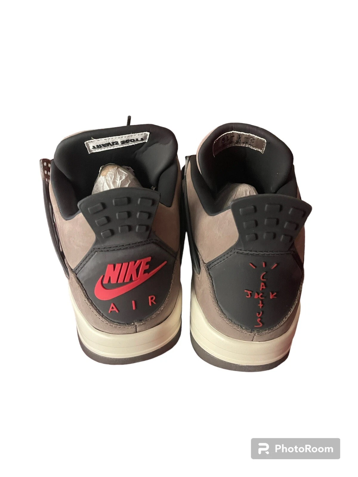 Travis Scott x Air Jordan AJ4 brown replica sneakers showcasing a stylish design with premium materials, perfect for sneaker enthusiasts and collectors.