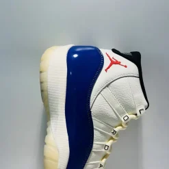 2025 Air Jordan 11 “Rare Air” replica sneakers featuring a sleek black and white design with glossy patent leather accents, perfect for sneaker enthusiasts seeking high-quality craftsmanship.