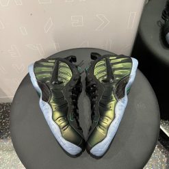 Nike Air Foamposite Pro Pine Green replica sneakers featuring a sleek design, vibrant pine green colorway, and a classic, textured upper perfect for sneaker enthusiasts.