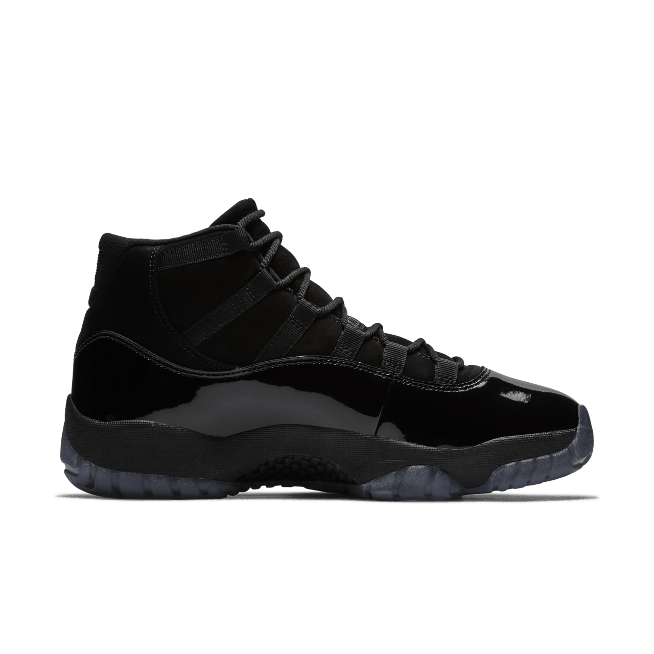 Air Jordan 11 Cap And Gown replica sneakers featuring a sleek black textile upper, patent leather details, and a translucent outsole, perfect for stylish footwear enthusiasts.