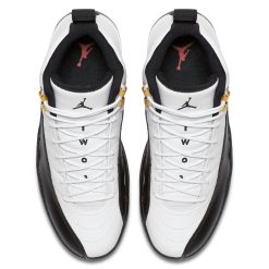 High-quality replica sneakers featuring the Air Jordan 12 Taxi model in a striking black and white colorway with distinctive yellow accents.