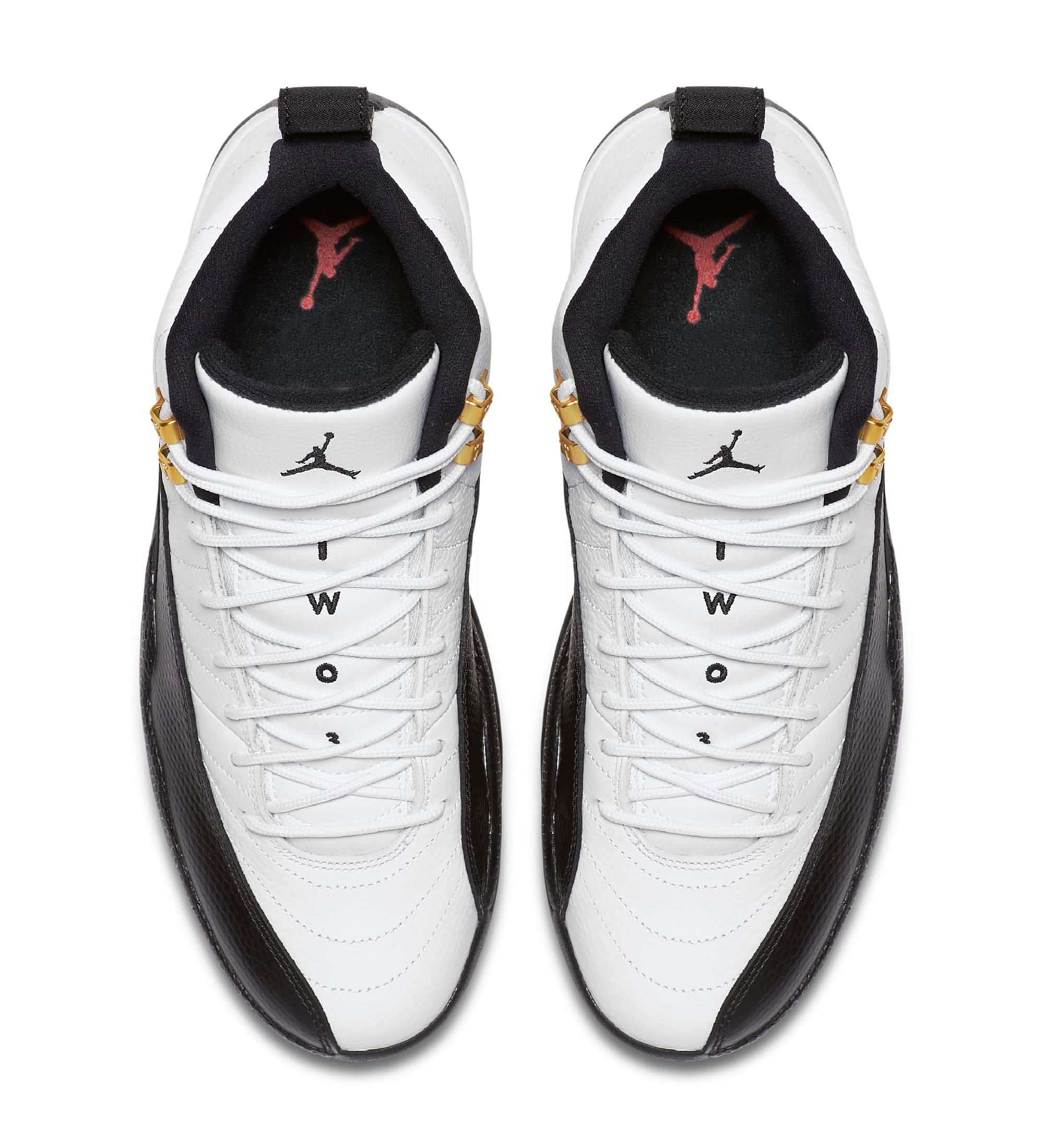 High-quality replica sneakers featuring the Air Jordan 12 Taxi model in a striking black and white colorway with distinctive yellow accents.