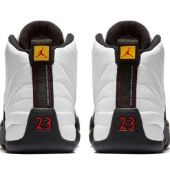 Air Jordan 12 Taxi replica sneakers showcasing a stylish black and white design with striking yellow accents, perfect for sneaker enthusiasts seeking high-quality replicas.