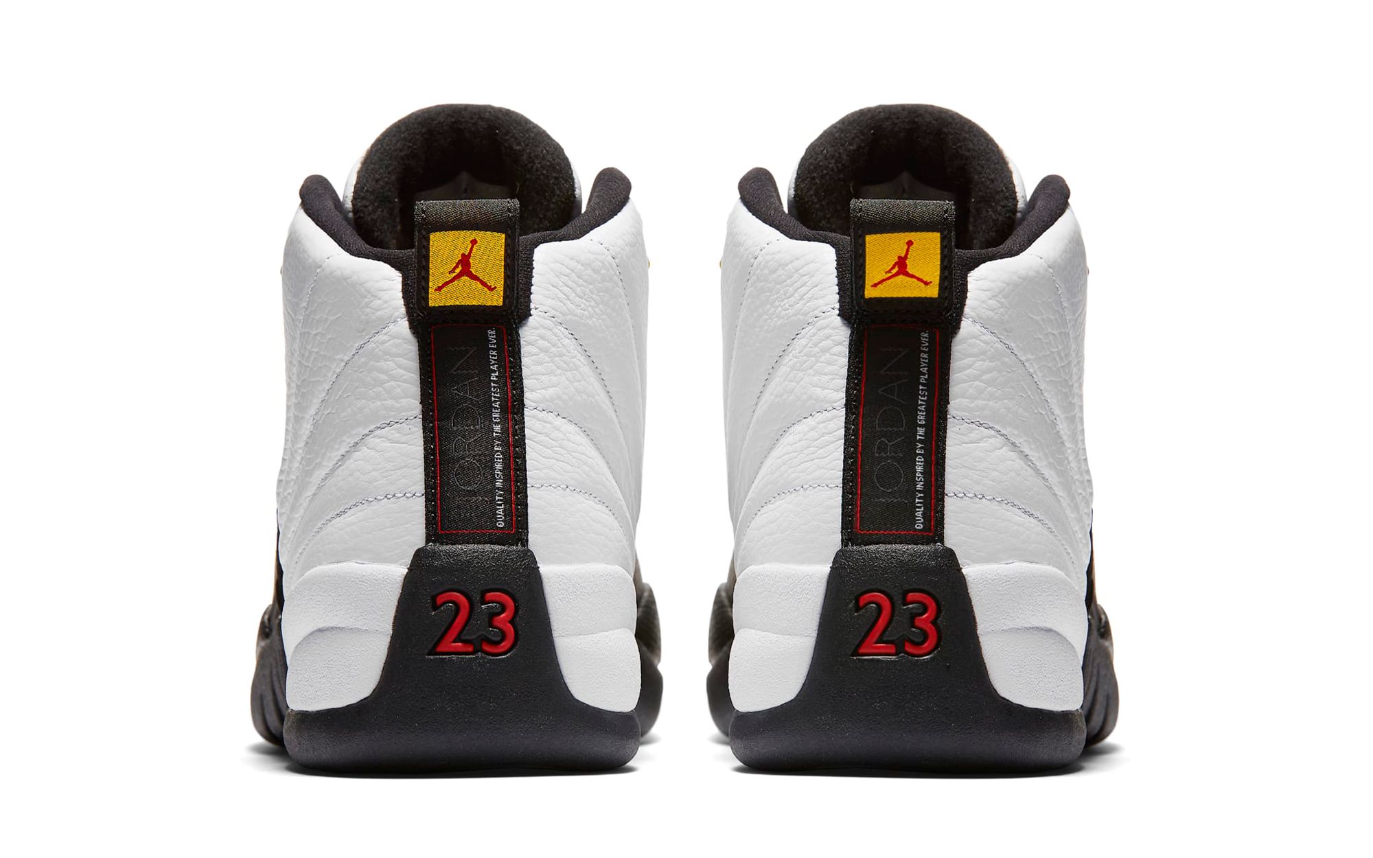 Air Jordan 12 Taxi replica sneakers showcasing a stylish black and white design with striking yellow accents, perfect for sneaker enthusiasts seeking high-quality replicas.