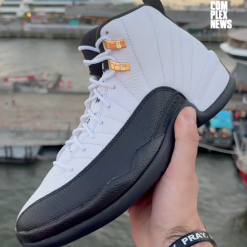 Air Jordan 12 Taxi 2025 CT8013 117 high-quality replica sneakers showcasing a classic black, white, and taxi yellow colorway, featuring premium materials and attention to detail, perfect for sneaker enthusiasts.