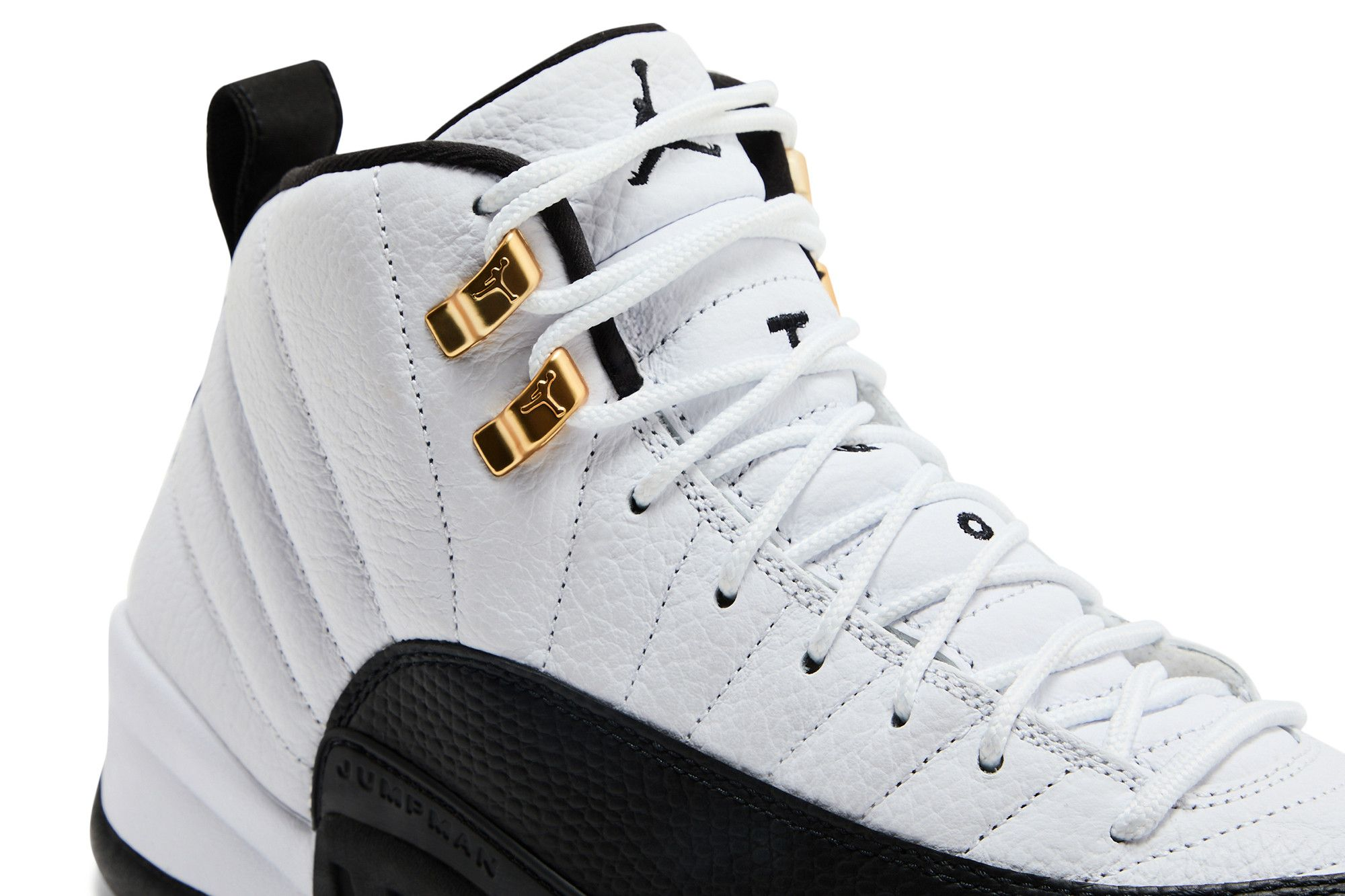 Air Jordan 12 Taxi replica sneakers showcasing a high-quality design with classic black and white colorway, featuring the iconic golden accents and textured upper, perfect for sneaker enthusiasts and collectors.