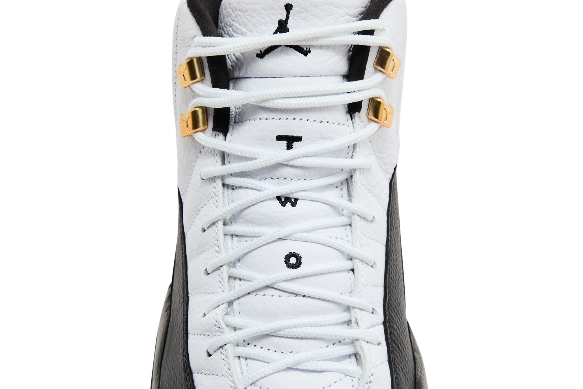High-quality replica sneakers featuring the Air Jordan 12 Taxi design, showcasing a stylish black and white colorway with iconic gold accents.