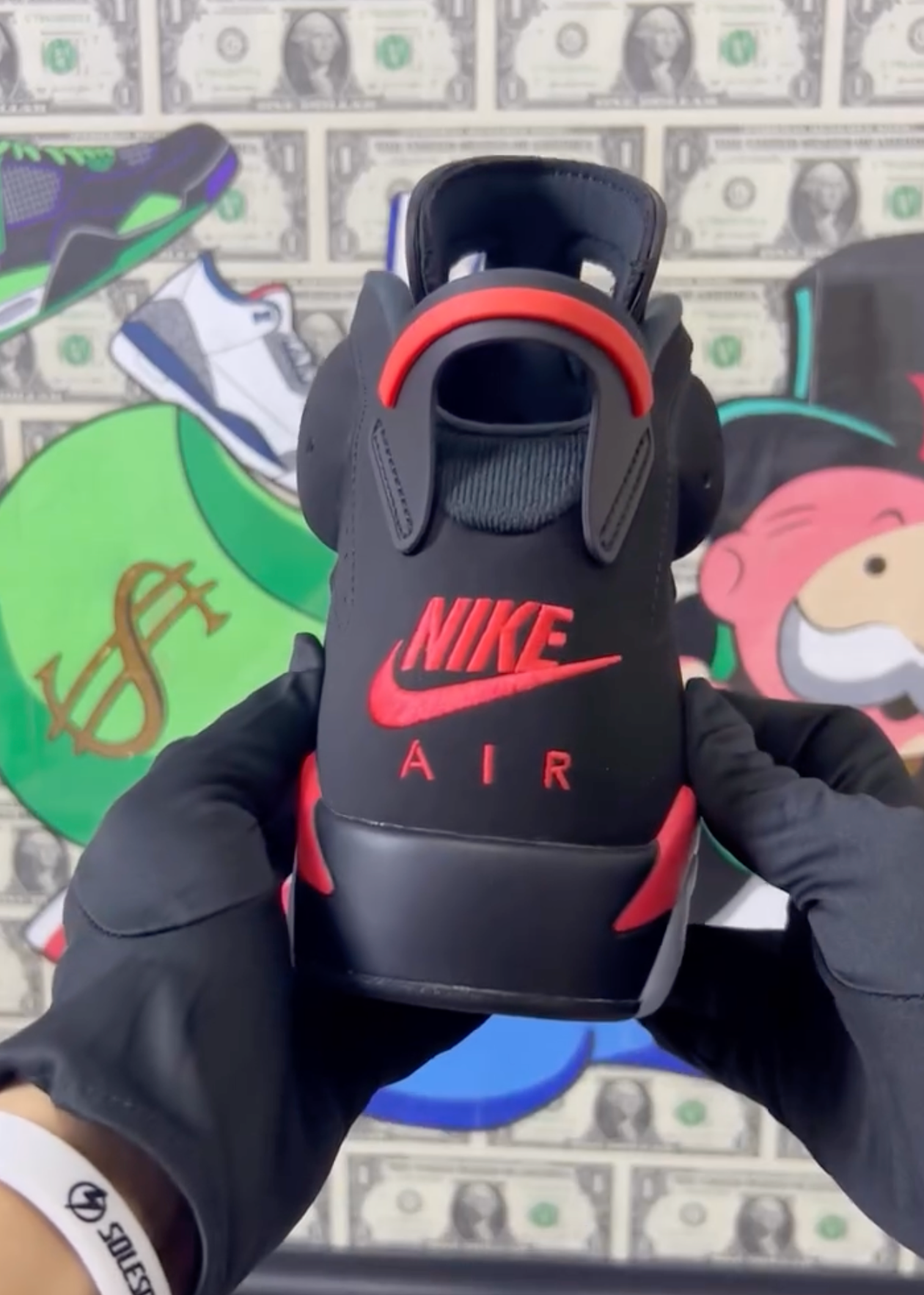 Air Jordan 6 Reverse Infrared replica sneakers featuring a sleek black upper with vibrant infrared accents, perfect for sneaker enthusiasts seeking high-quality replicas.