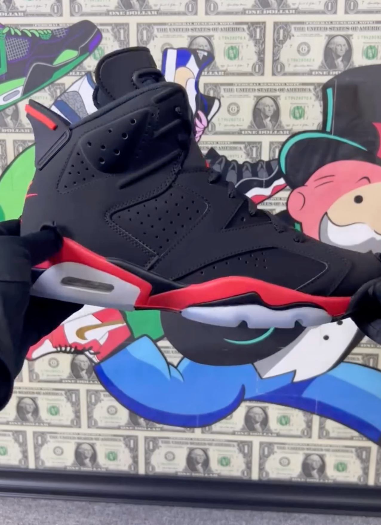 High-quality Air Jordan 6 Reverse Infrared replica sneakers featuring a black upper with infrared accents and a classic design, perfect for sneaker enthusiasts and collectors.