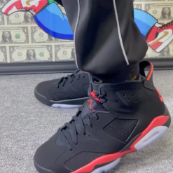 Air Jordan 6 Reverse Infrared high-quality replica sneakers featuring a striking black and infrared colorway, showcasing premium materials and attention to detail for sneaker enthusiasts.