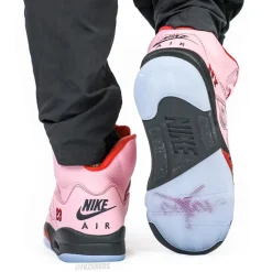 Awake NY Air Jordan 5 Arctic Pink, stylish replica sneakers featuring a soft pink upper, contrasting details, and a sleek design perfect for sneaker enthusiasts.