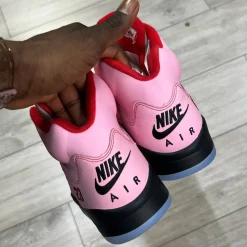 Awake Ny Air Jordan 5 Pink replica sneakers featuring a vibrant pink colorway with premium detailing, perfect for sneaker enthusiasts looking for high-quality replicas.