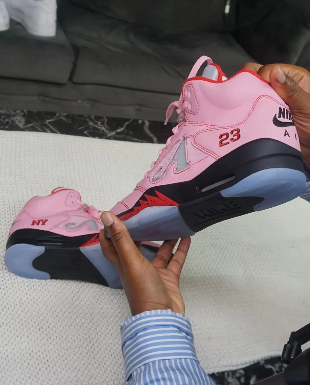 Awake NY Air Jordan 5 Pink replica sneakers featuring a vibrant pink and white colorway, showcasing the iconic silhouette and quality craftsmanship expected from premium replica footwear.